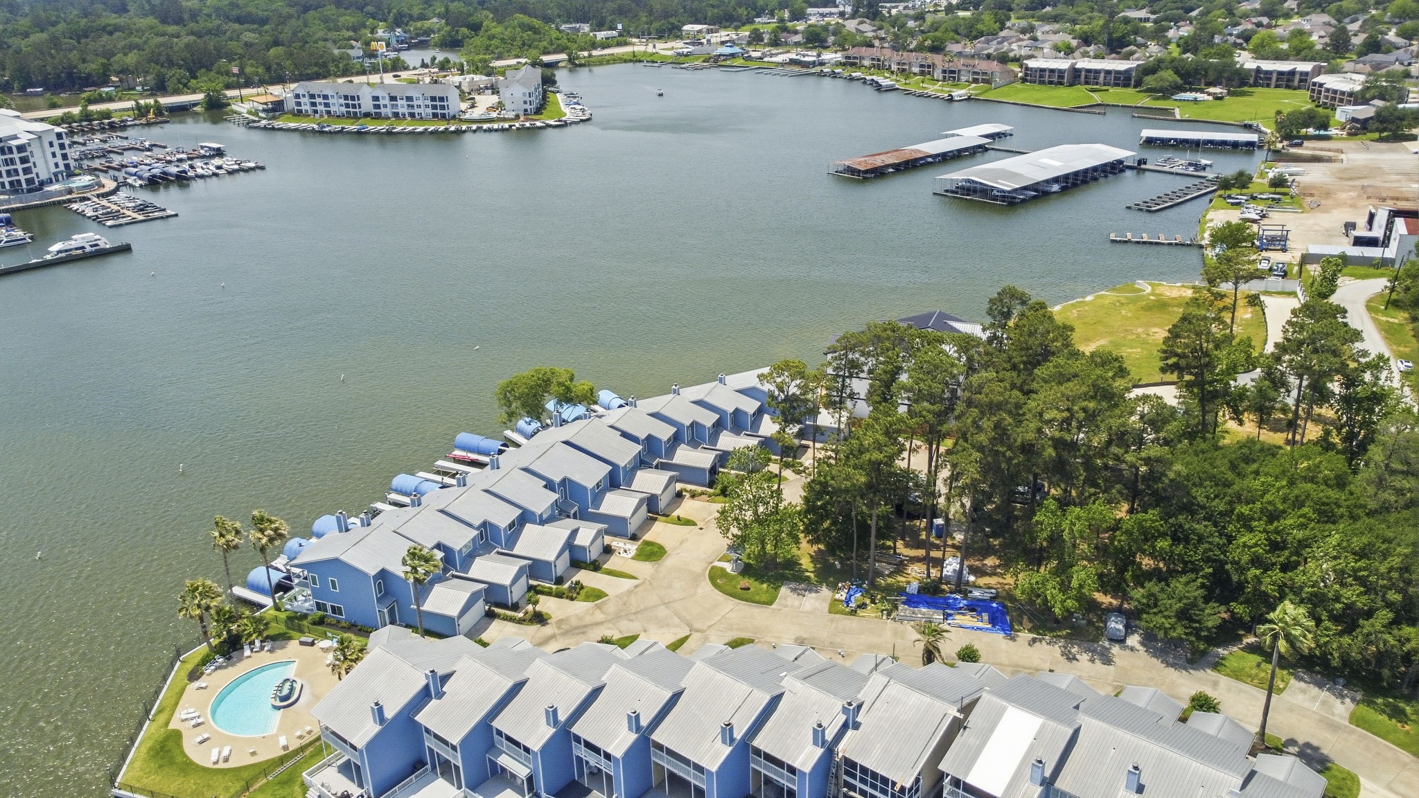2 Key Harbour Conroe, TX 77356 - Photo 3 of 41 an aerial view of lake residential houses with outdoor space