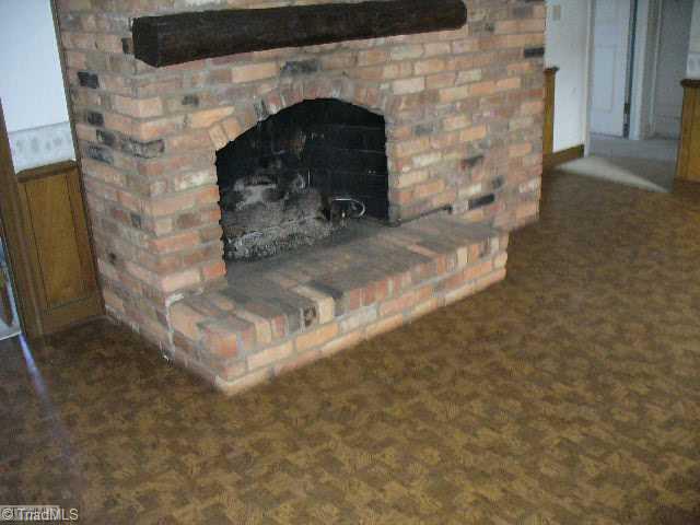 304 Hamilton Road Lexington, NC 27295 - Photo 3 of 6 Living Room. Brick fireplace in lving room and basement!