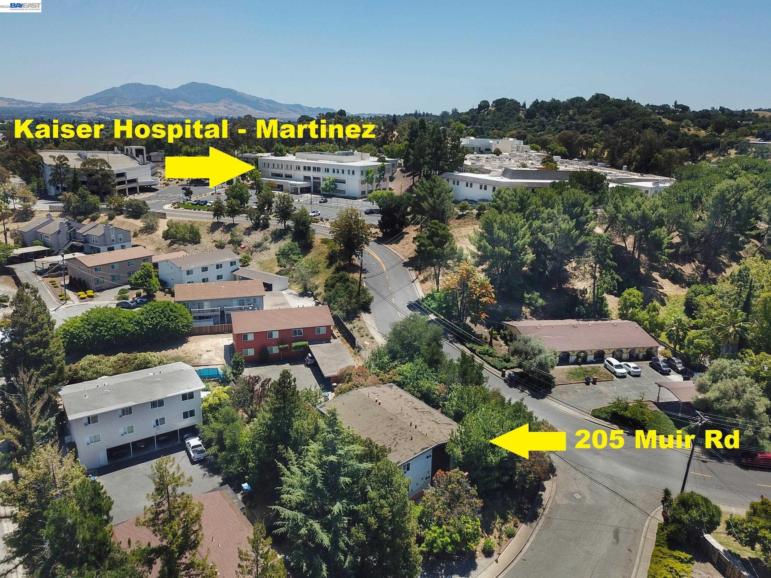 205 Muir Road Martinez, CA 94553 - Photo 1 of 20 an aerial view of a swimming pool patio and outdoor seating