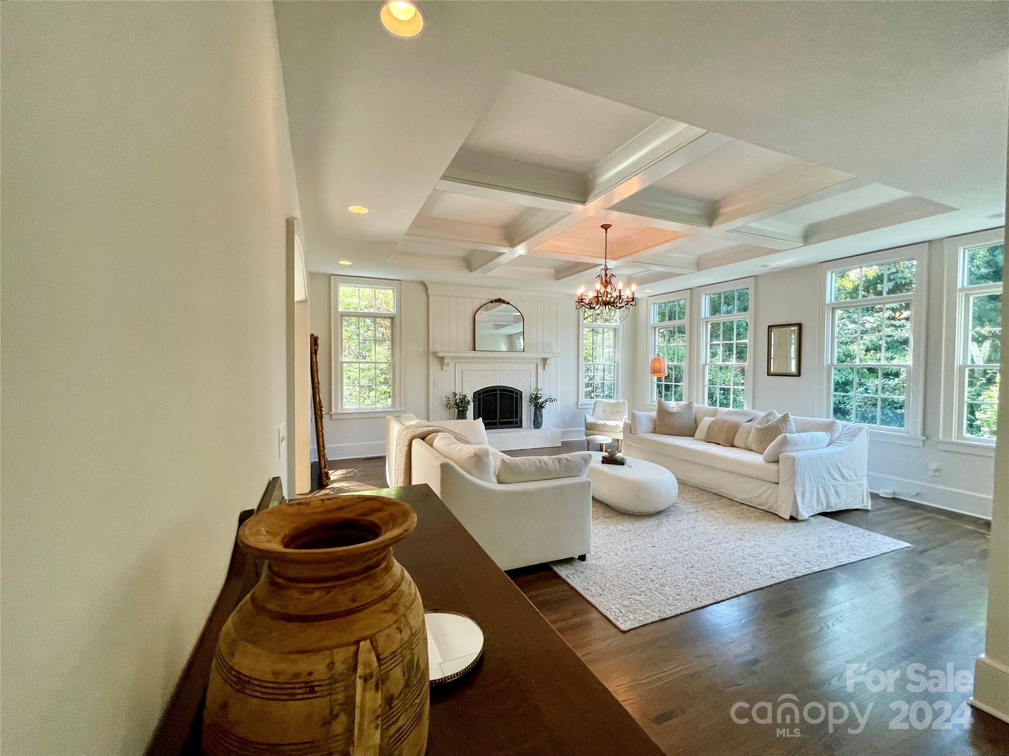 526 Lorimer Road Davidson, NC 28036 - Photo 18 of 41 a living room with fireplace furniture and a large window