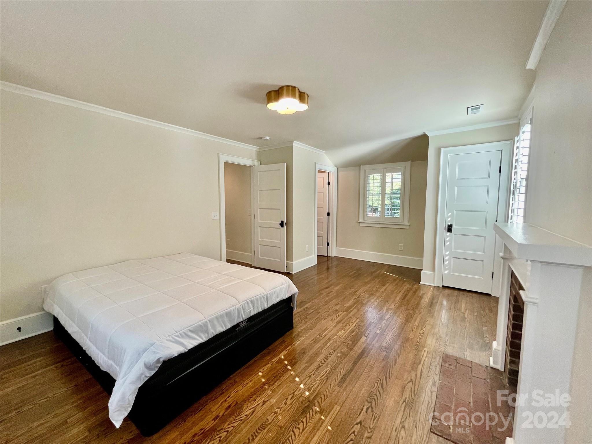526 Lorimer Road Davidson, NC 28036 - Photo 30 of 41 a bed room with a bed and window