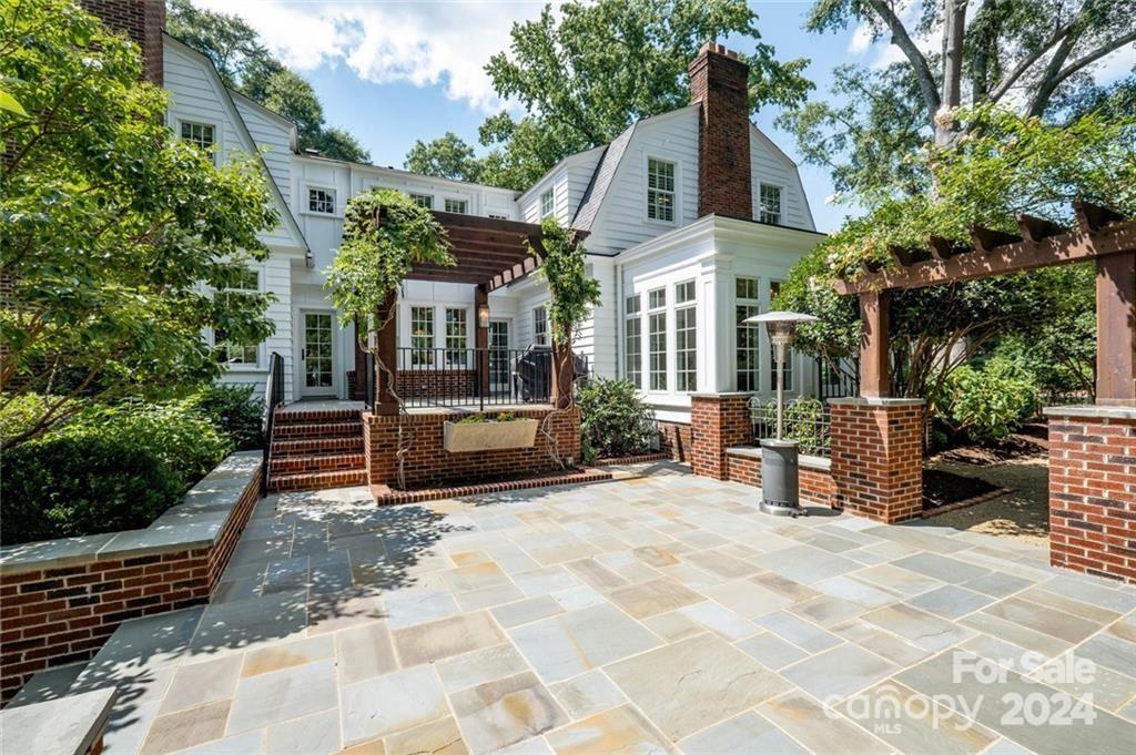 526 Lorimer Road Davidson, NC 28036 - Photo 5 of 41 a view of a house with outdoor space
