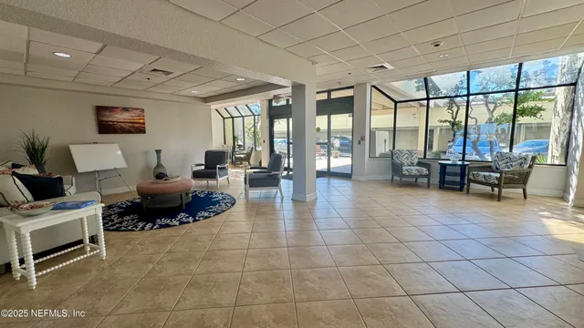 a kitchen with stainless steel appliances granite countertop a refrigerator and a stove