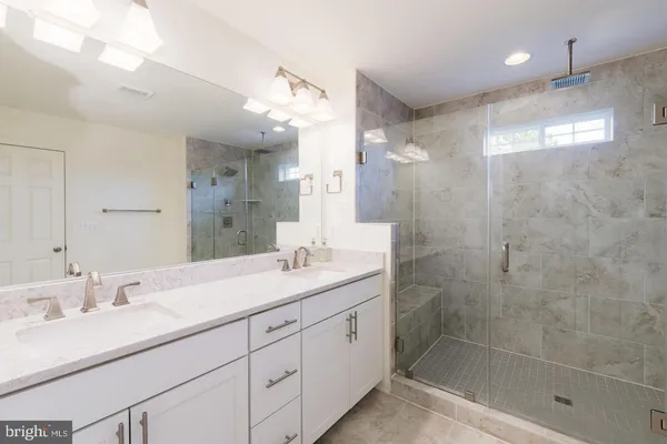 a utility room with cabinets