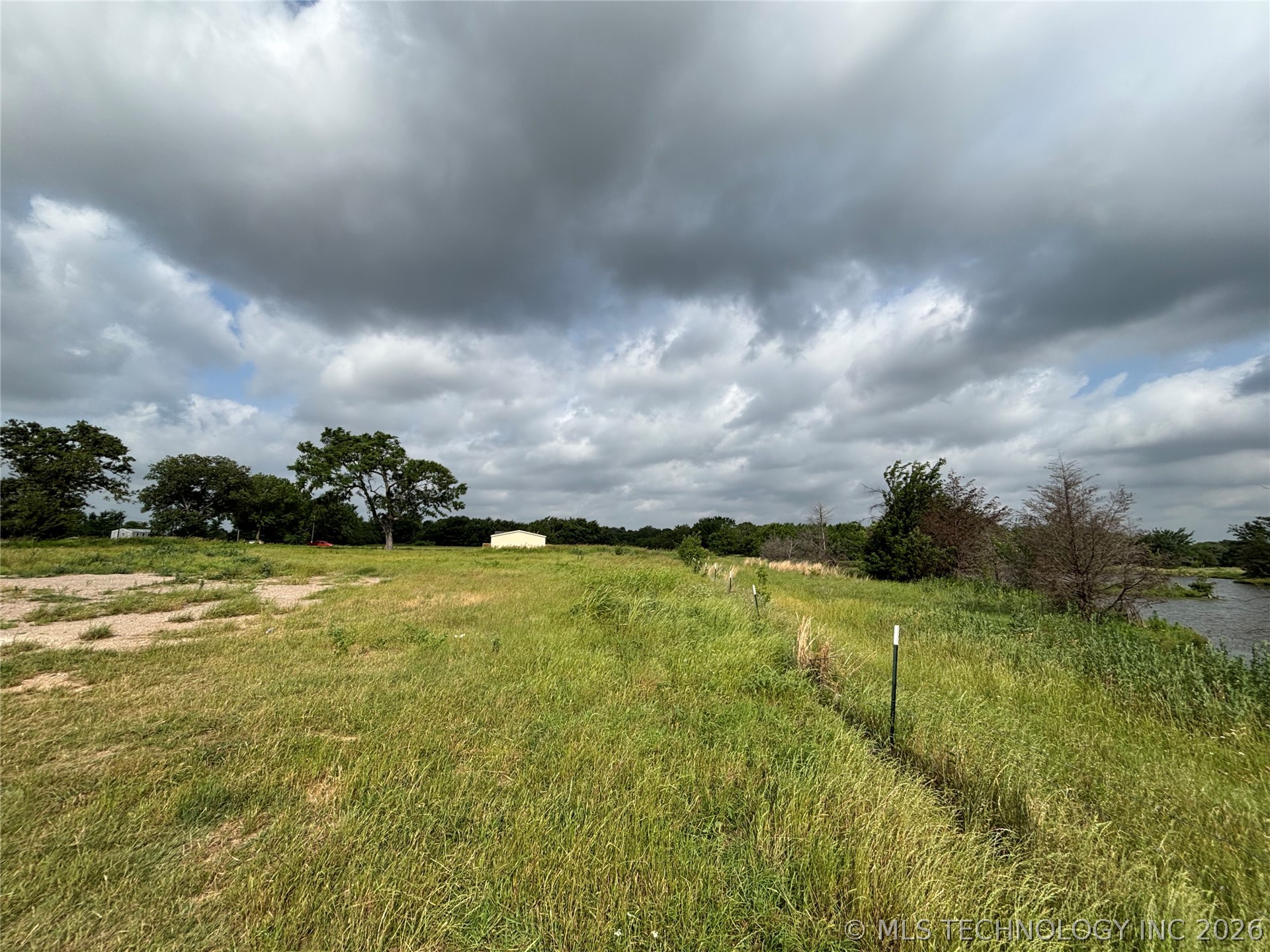 5387 Hendrix Road Hendrix, OK 74741 - Photo 5 of 51 From the east side of the property looking west towards the house