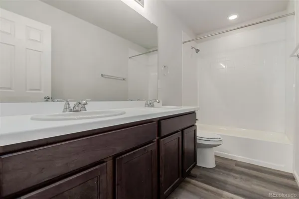 a view of a swimming pool with an outdoor seating