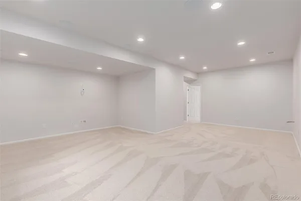 a view of a swimming pool with an outdoor seating