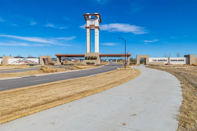 a view of a swimming pool with an outdoor seating
