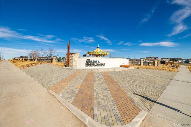 a view of a swimming pool with an outdoor seating