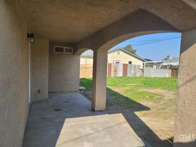 a view of a porch with a backyard