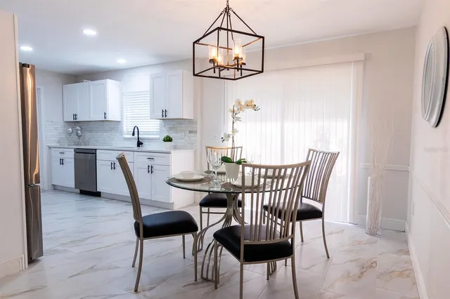 a view of a dining room with furniture