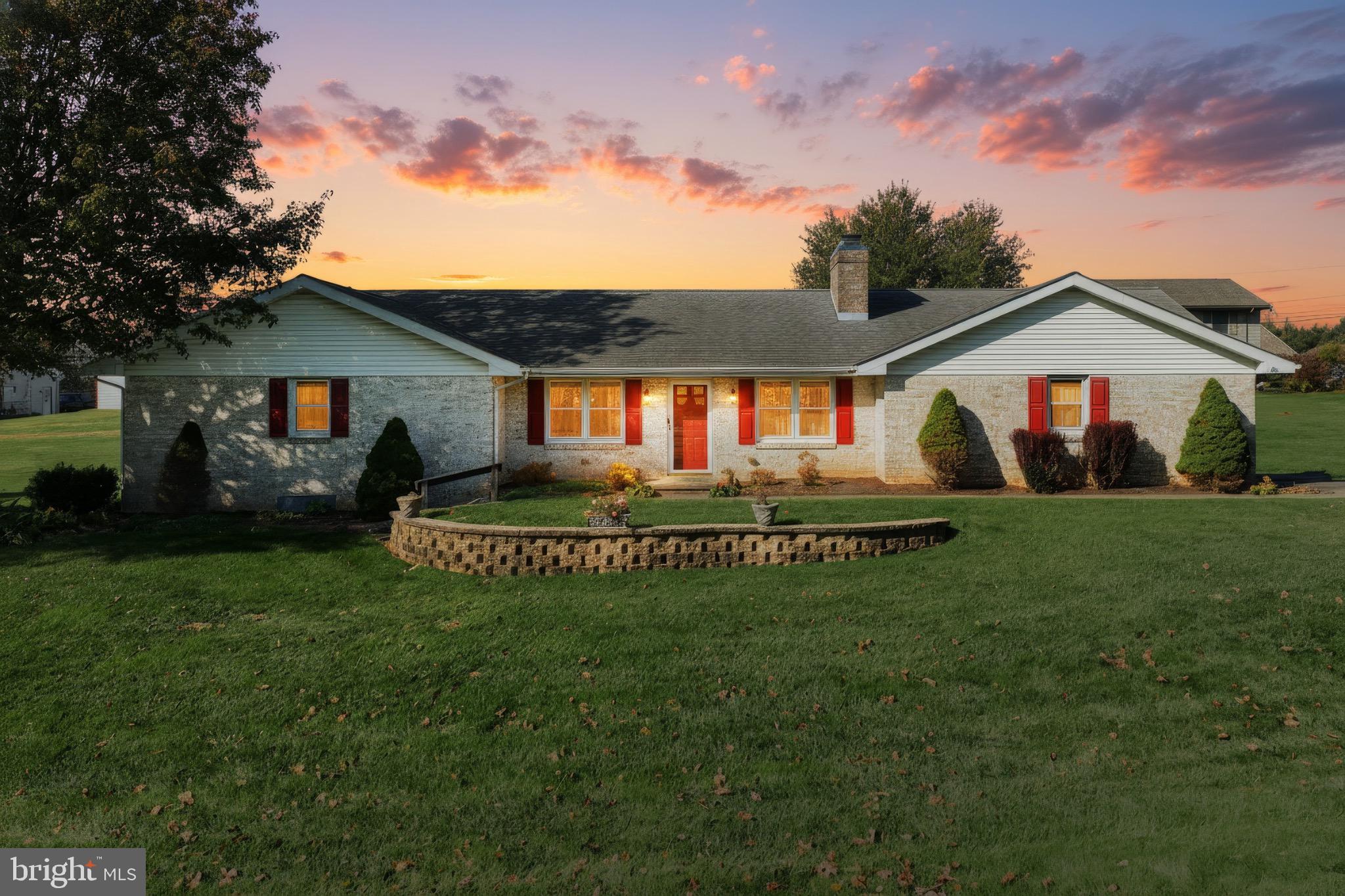 244 Miller Road Akron, PA 17501 - Photo 1 of 34 Charming home basking in sunset glow.