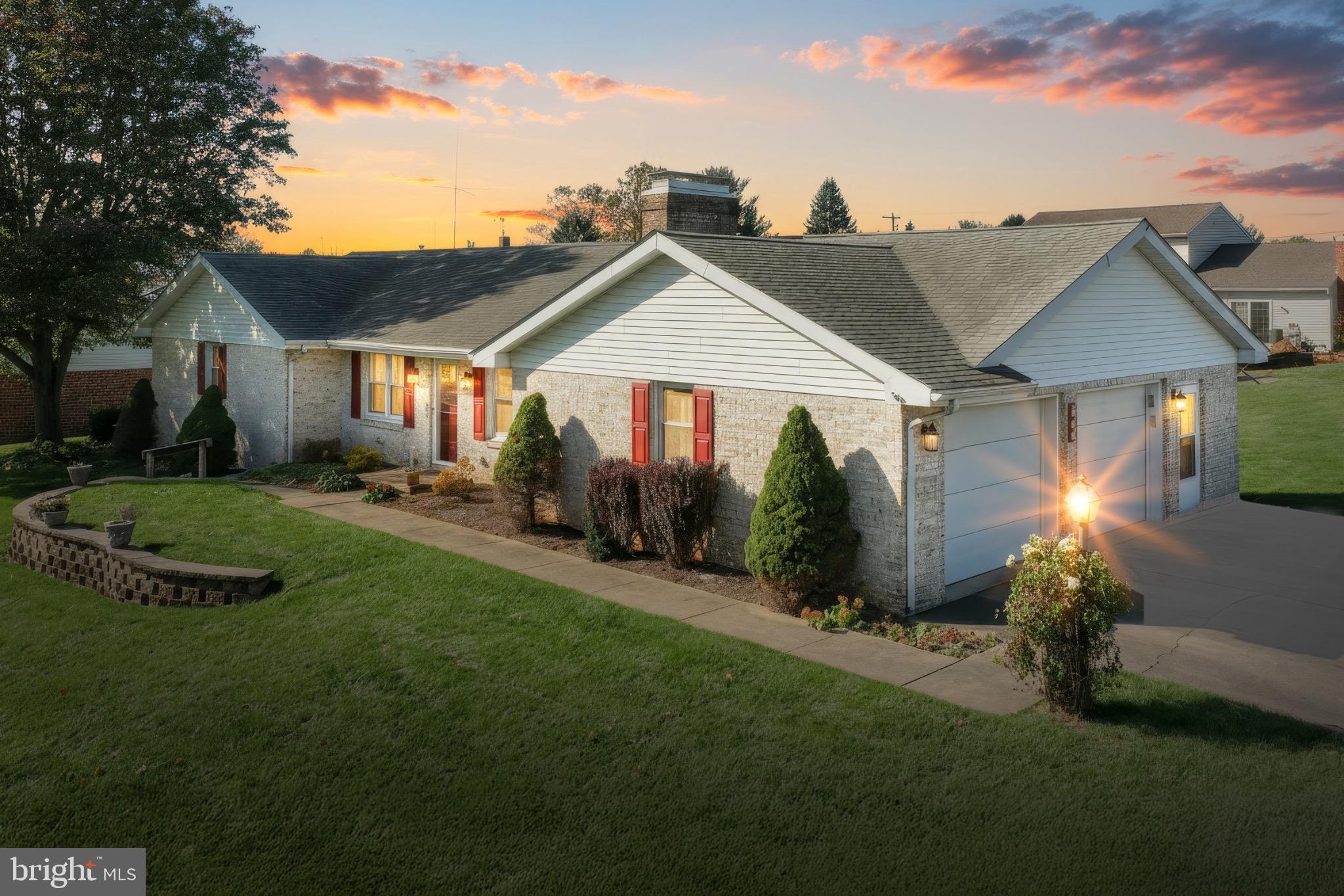 244 Miller Road Akron, PA 17501 - Photo 2 of 34 Charming home bathed in sunset glow.