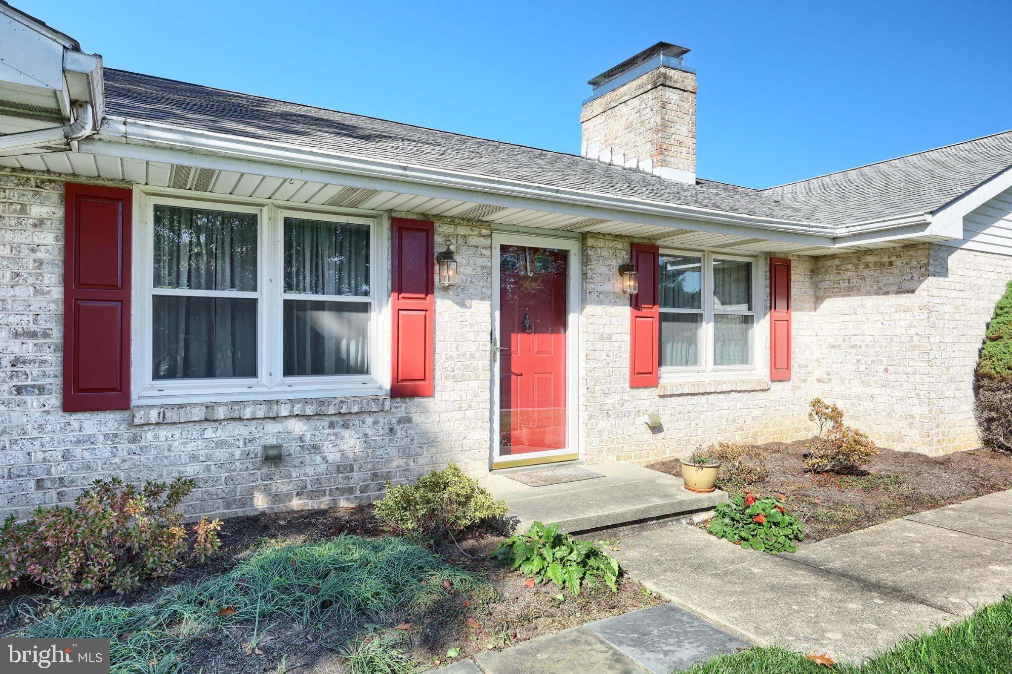 244 Miller Road Akron, PA 17501 - Photo 32 of 34 Charming home with vibrant red accents.