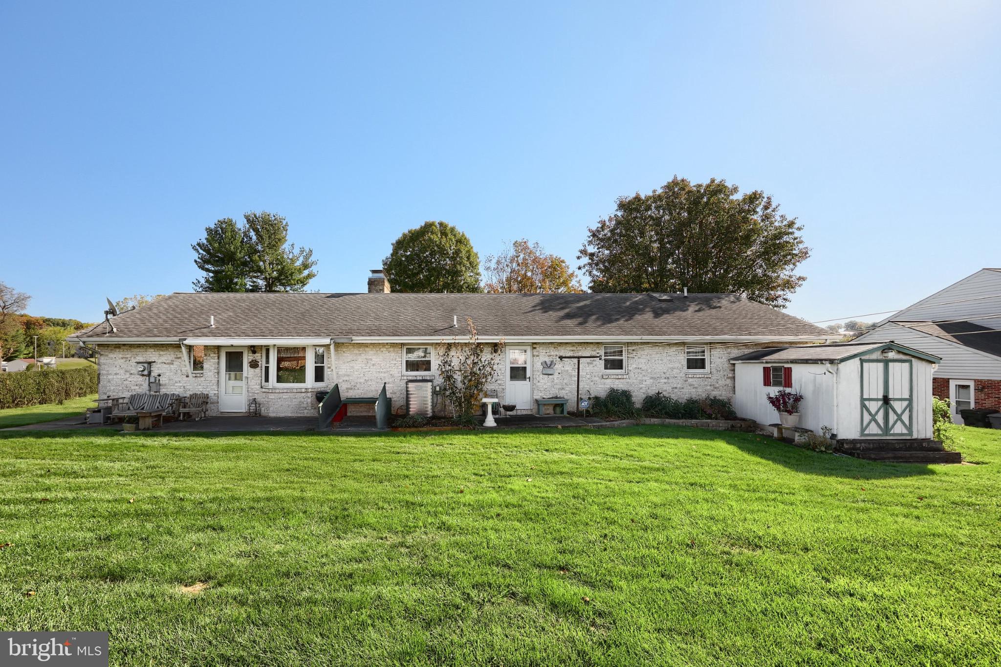 244 Miller Road Akron, PA 17501 - Photo 9 of 34 Charming home with expansive green lawn.
