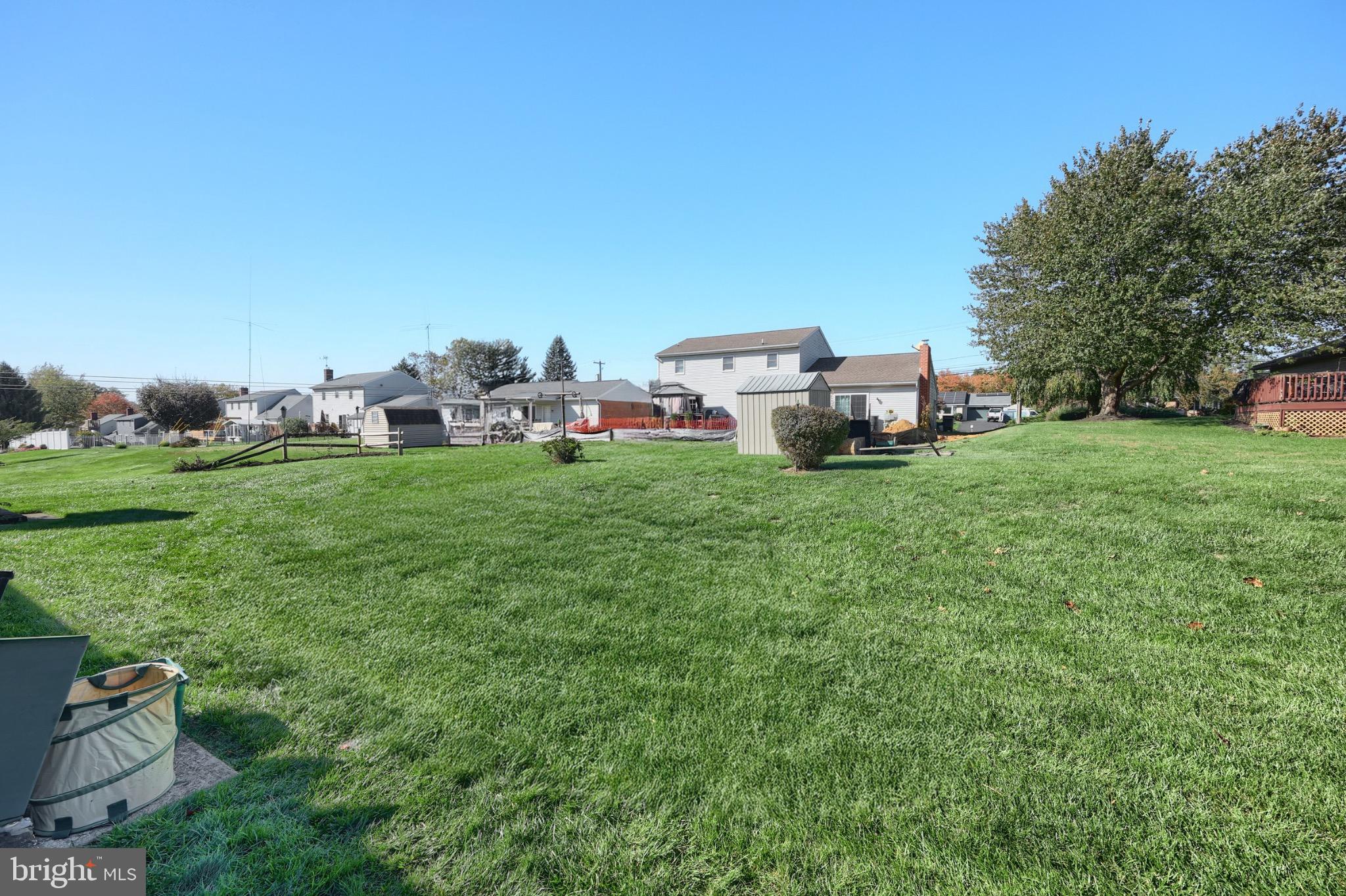 244 Miller Road Akron, PA 17501 - Photo 10 of 34 Spacious green yard with charming homes nearby.
