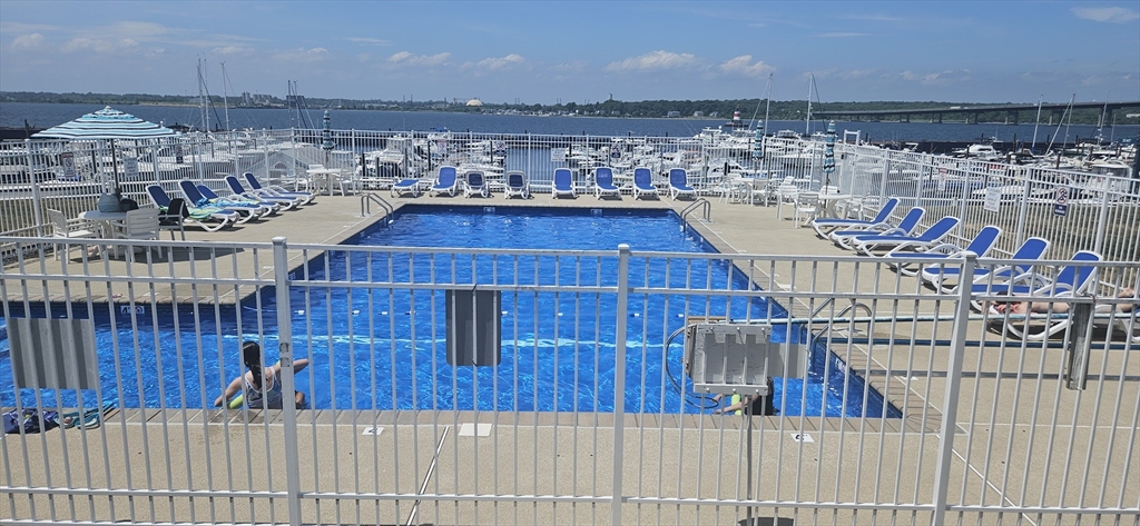 700 Shore Drive, Unit 513 Fall River, MA 02721 - Photo 12 of 12 a view of a balcony with wooden floor