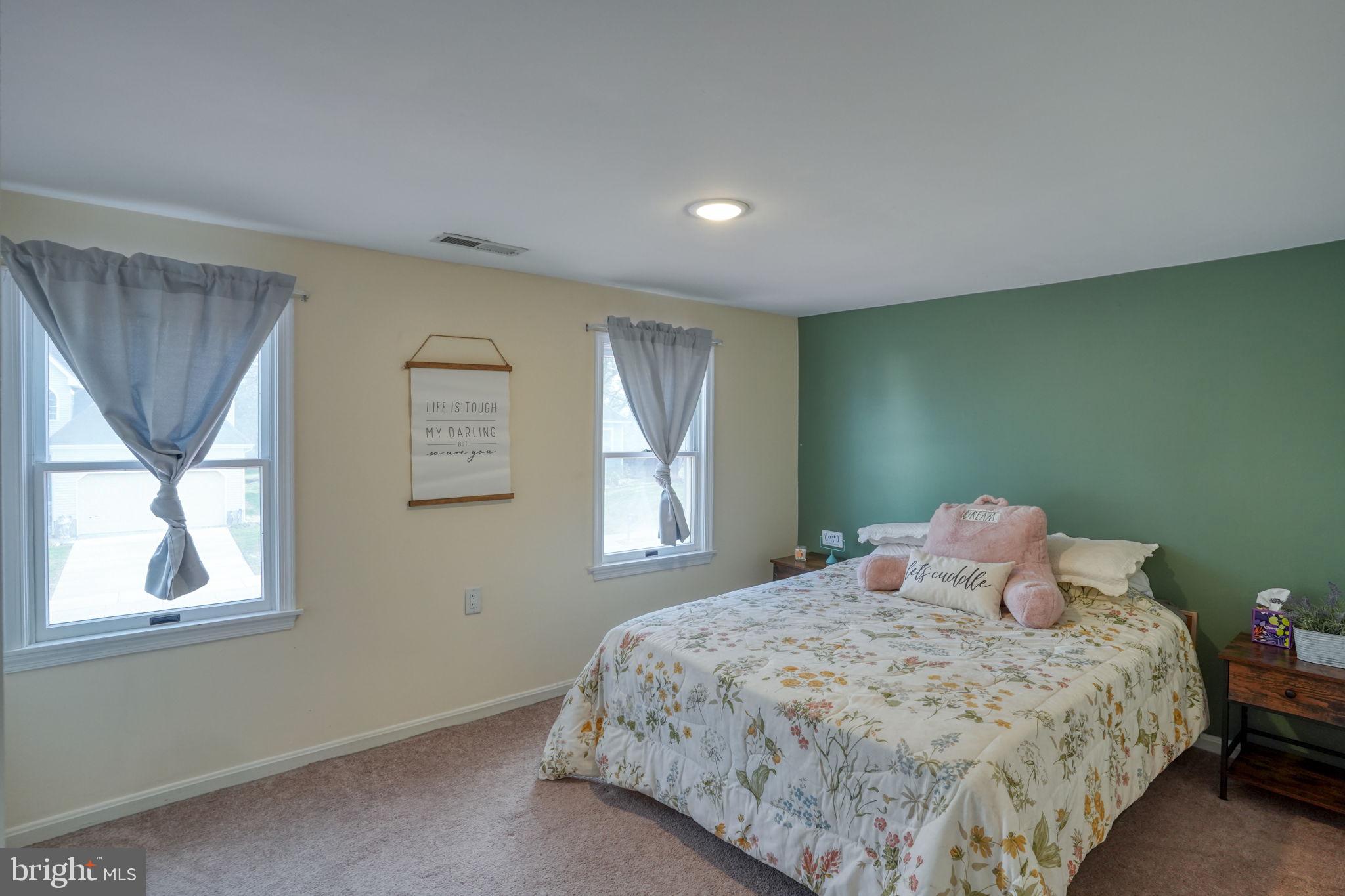 31 Washington Street Dover, DE 19901 - Photo 26 of 38 a bedroom with a bed and window