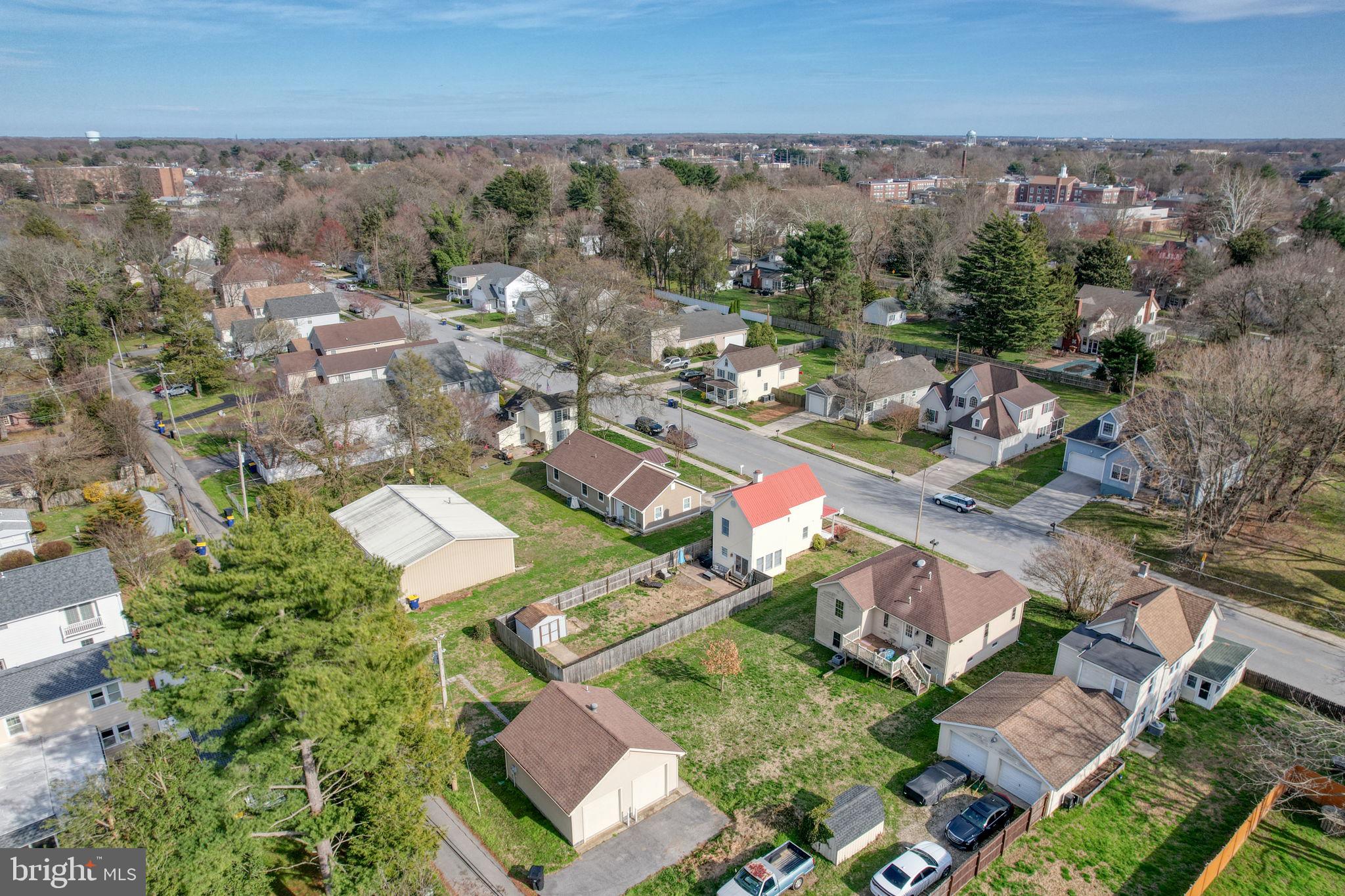 31 Washington Street Dover, DE 19901 - Photo 7 of 38 an aerial view of residential houses with outdoor space