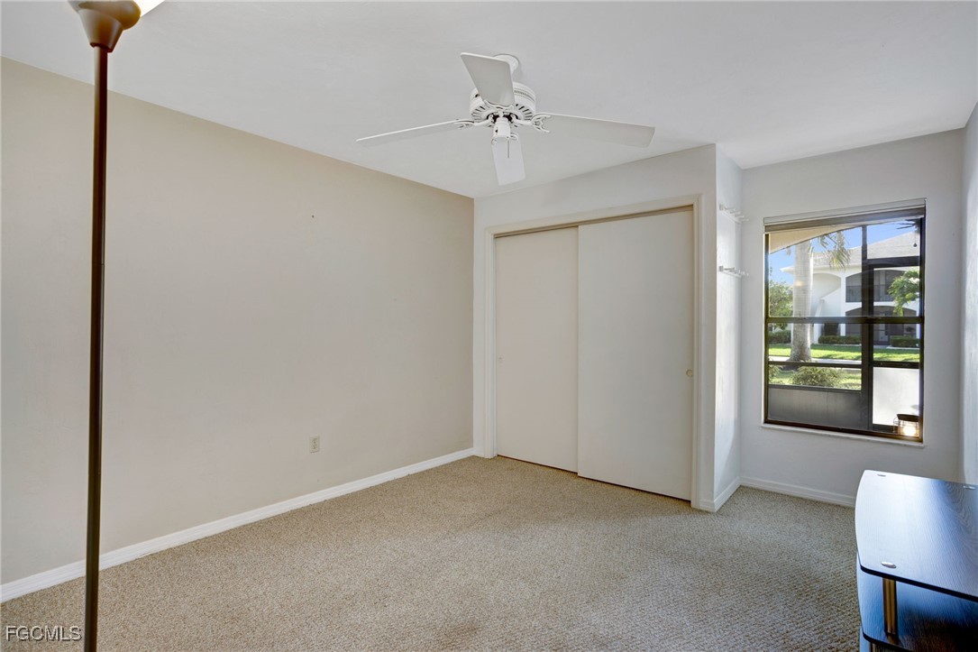 13256 Whitehaven Lane, Unit 501 Fort Myers, FL 33966 - Photo 18 of 28 a view of an empty room with a window