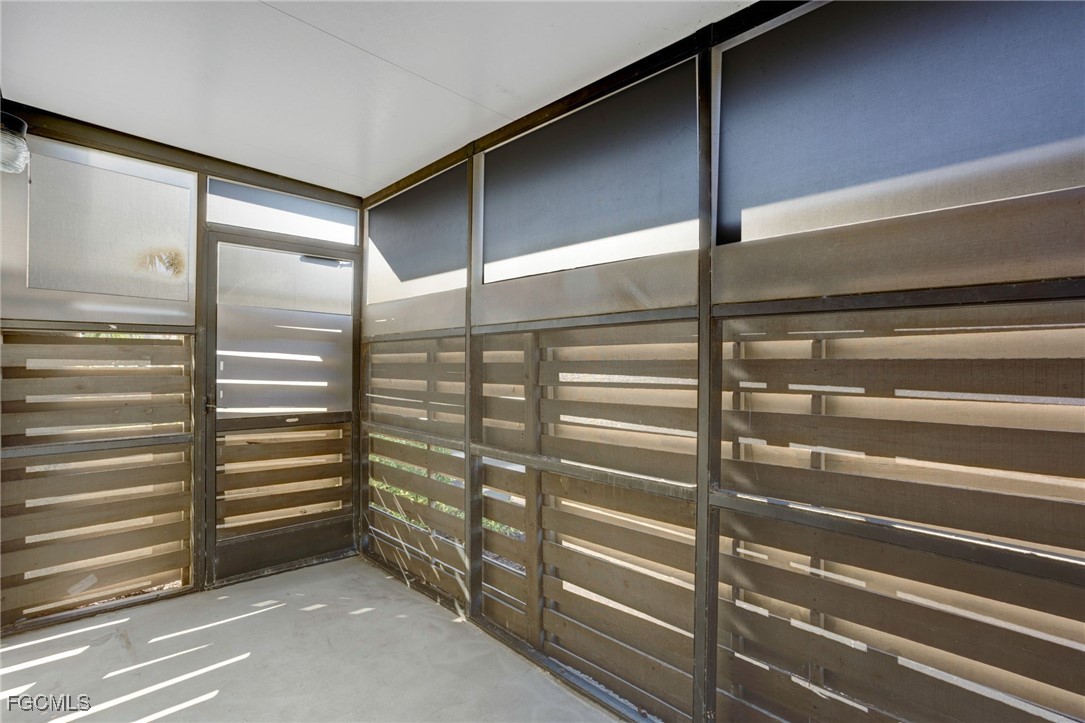 13256 Whitehaven Lane, Unit 501 Fort Myers, FL 33966 - Photo 22 of 28 a view of walk in closet with empty racks