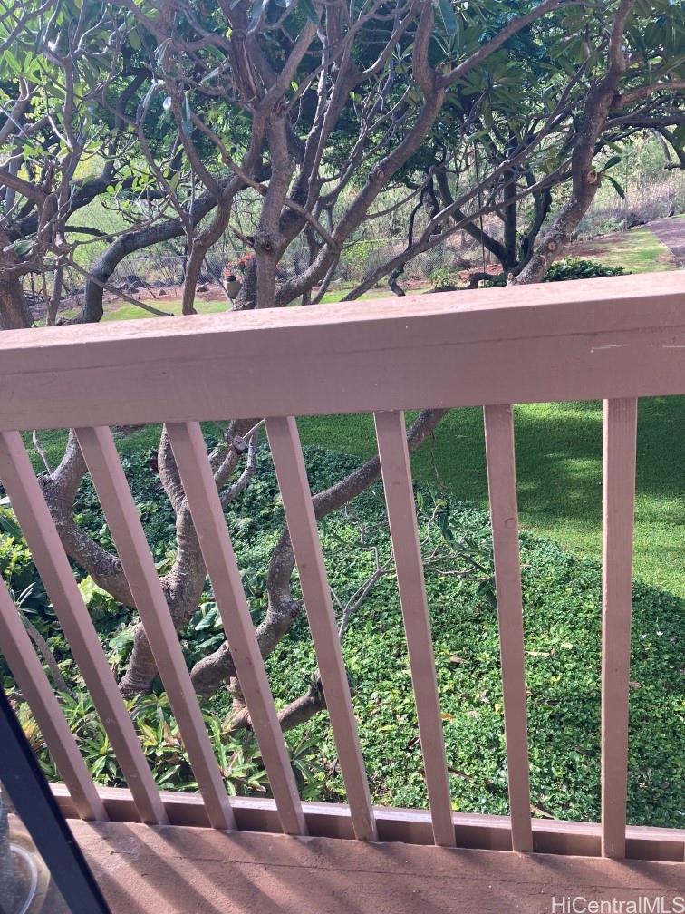 84-757 Kiana Place, Unit 724B Waianae, HI 96792 - Photo 11 of 11 a backyard of a house with lots of green space and outdoor seating