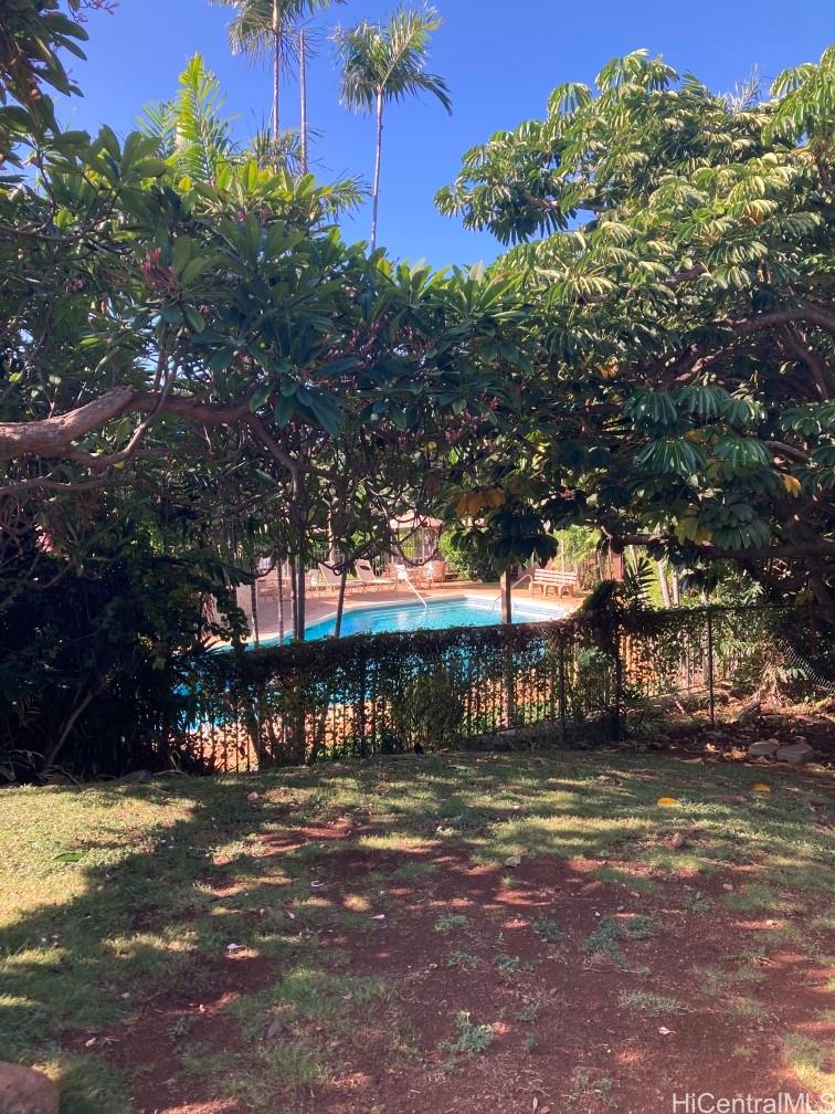 84-757 Kiana Place, Unit 724B Waianae, HI 96792 - Photo 10 of 11 a view of a yard with plants and trees