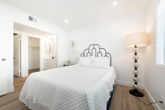 a bathroom with a bathtub and toilet