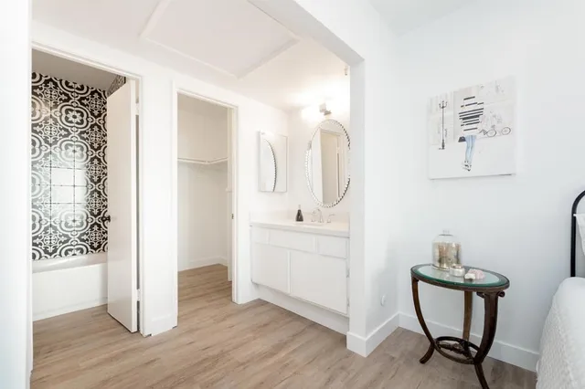 a view of a lake with houses in the back