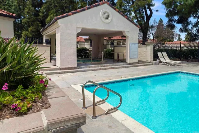 a view of a lake with outdoor seating space
