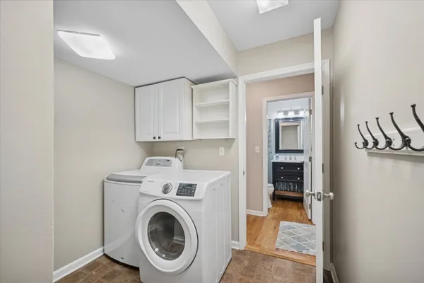 a view of a storage & utility room with washer and dryer