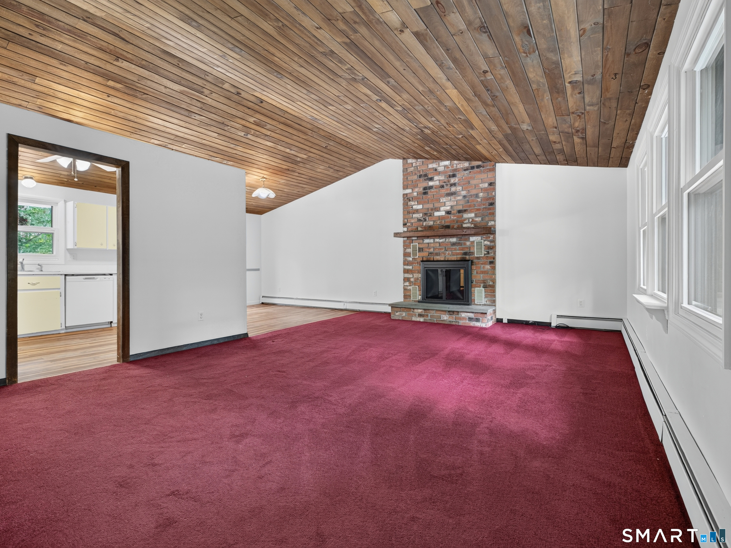 75 Airline Road Clinton, CT 06413 - Photo 2 of 37 an empty room with windows