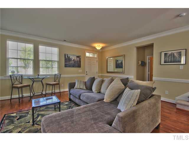 607 Conover Road Durham, NC 27703 - Photo 7 of 19 What a welcome! Gorgeous Living Room/Flex Space with new flooring, crisp white crown moulding and chair rail moulding. Living Room