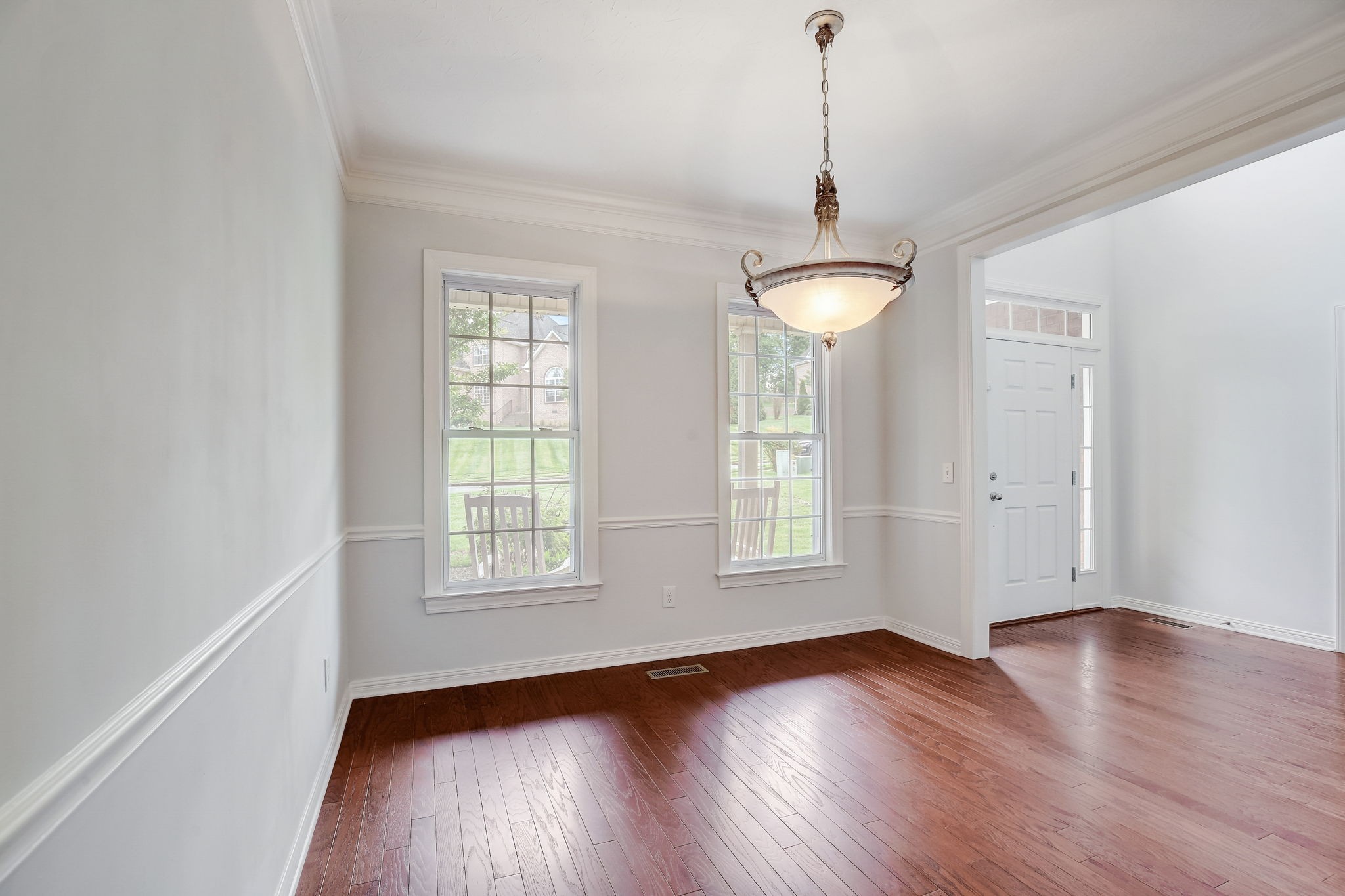 124 Cedar Ridge Lane Hendersonville, TN 37075 - Photo 13 of 66 a view of an empty room with wooden floor and a window