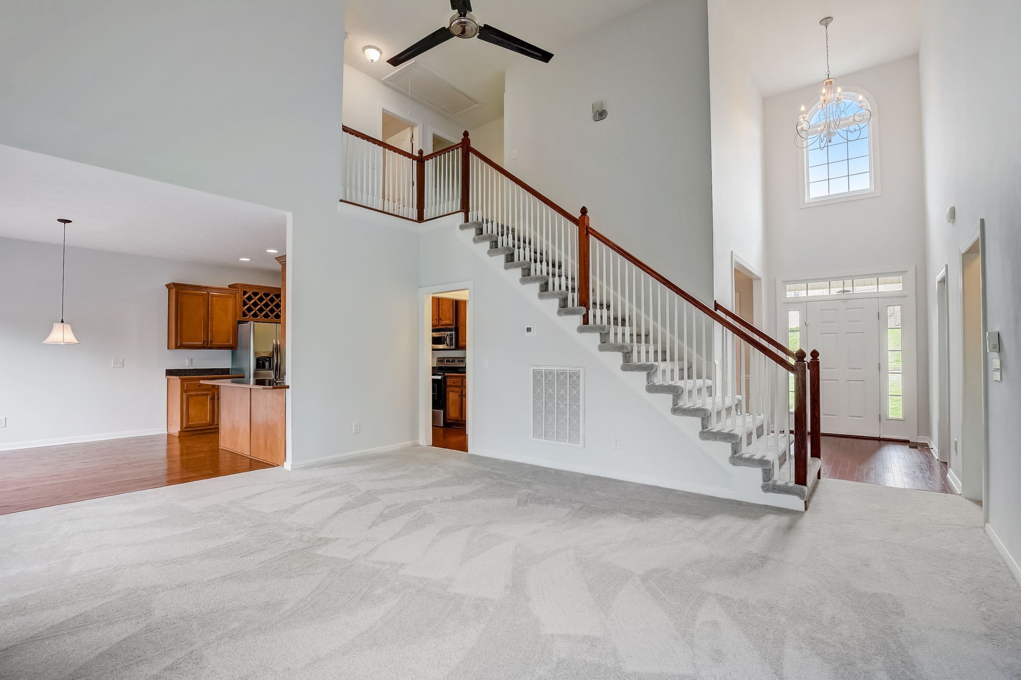 124 Cedar Ridge Lane Hendersonville, TN 37075 - Photo 15 of 66 a view of a hallway with wooden floor and stairs