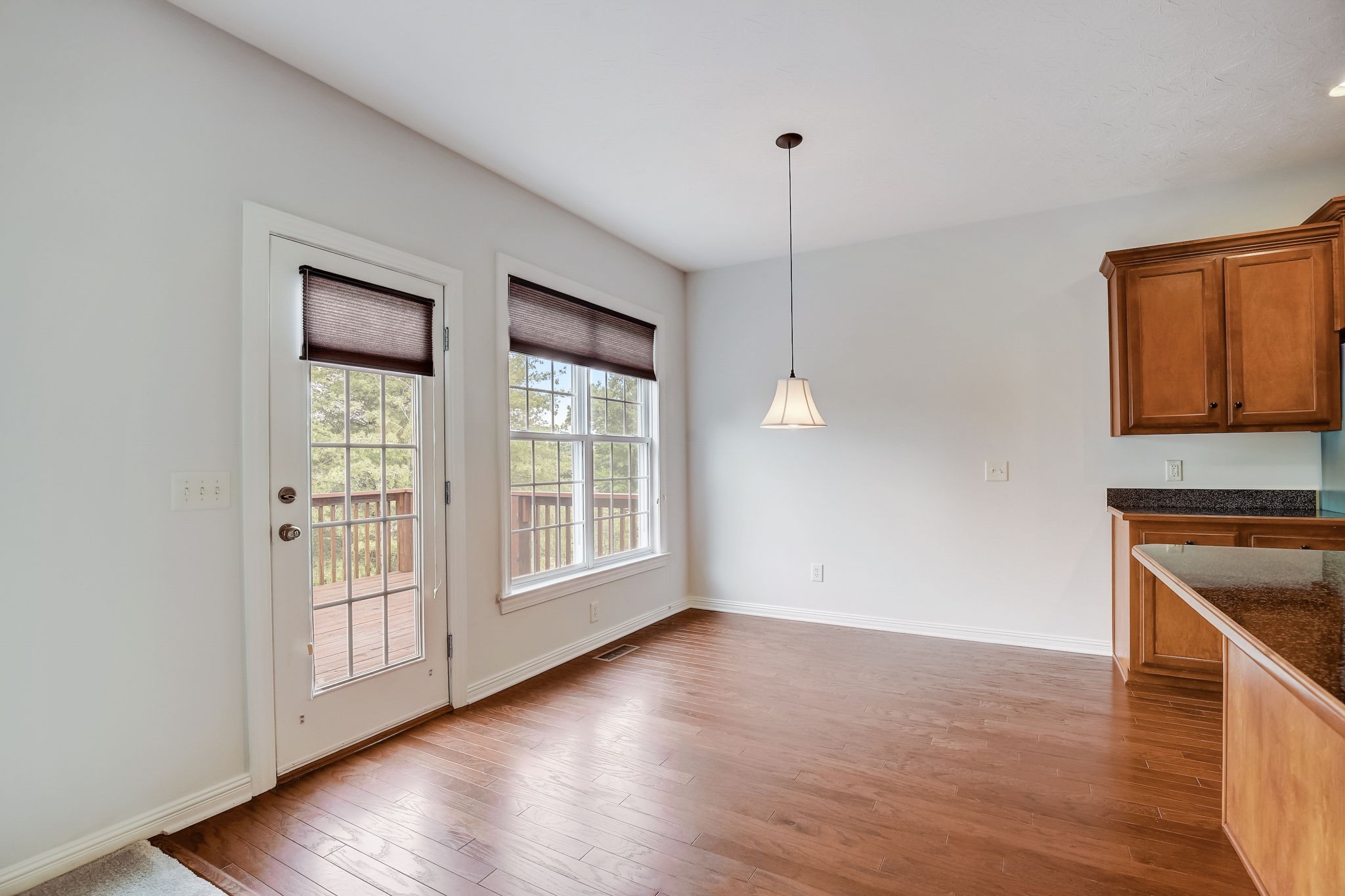 124 Cedar Ridge Lane Hendersonville, TN 37075 - Photo 19 of 66 a view of a kitchen with wooden floor and a window