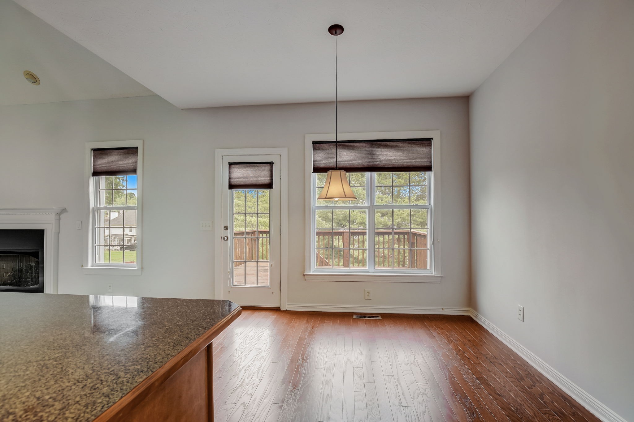124 Cedar Ridge Lane Hendersonville, TN 37075 - Photo 20 of 66 a view of an empty room with a window and wooden floor