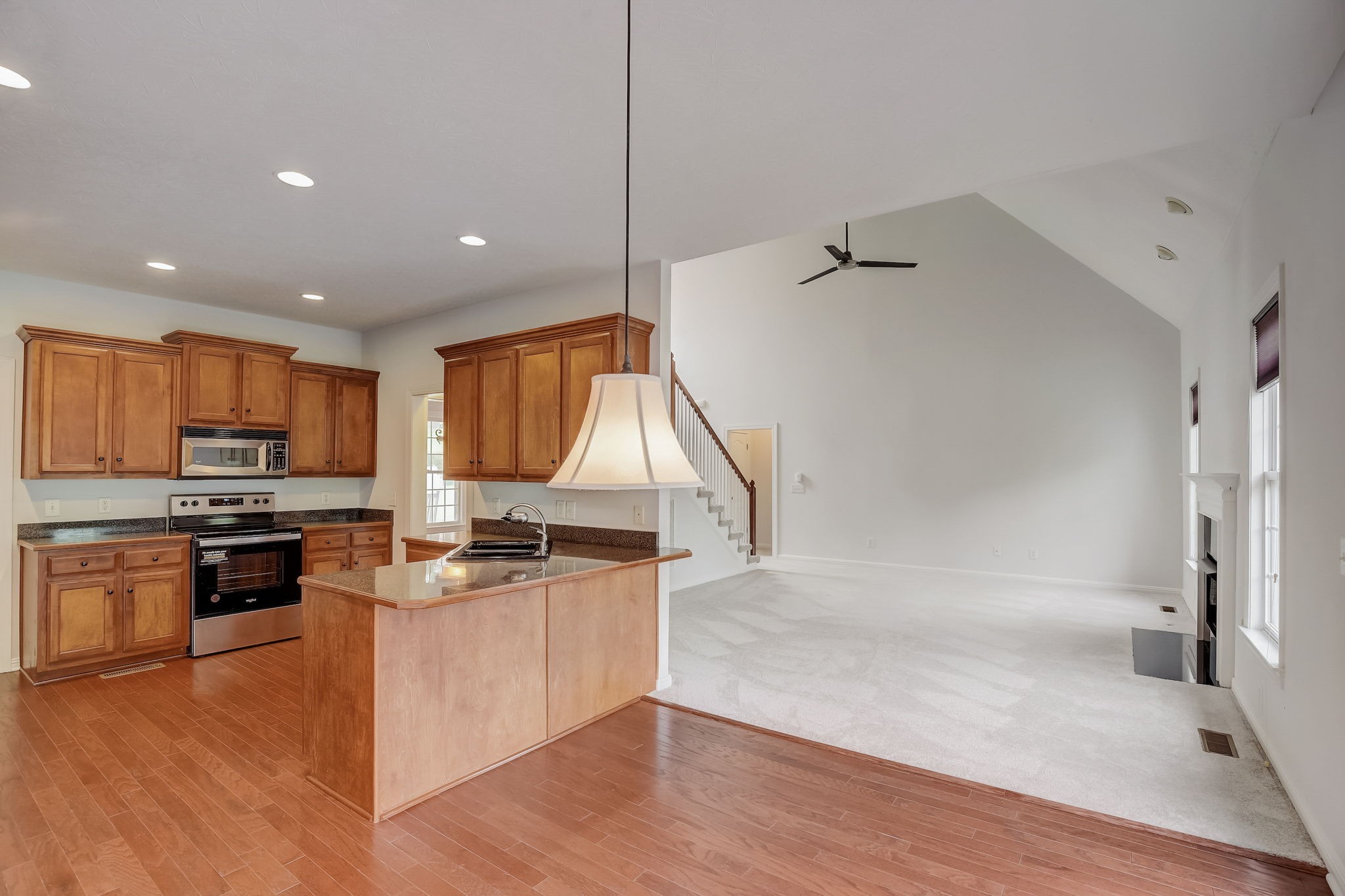 124 Cedar Ridge Lane Hendersonville, TN 37075 - Photo 21 of 66 a kitchen with stainless steel appliances granite countertop a sink stove and refrigerator