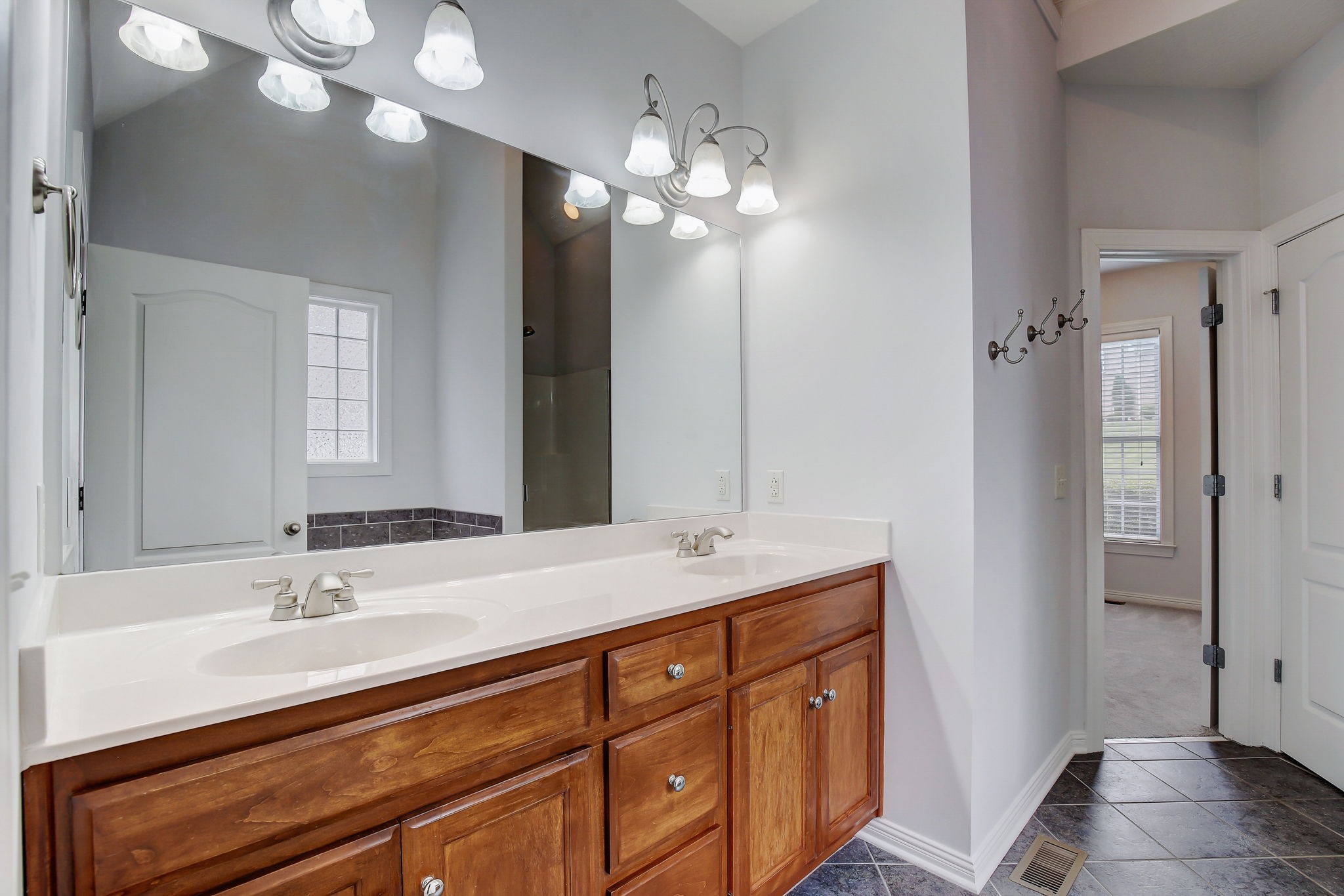 124 Cedar Ridge Lane Hendersonville, TN 37075 - Photo 32 of 66 a bathroom with a sink a vanity and a mirror