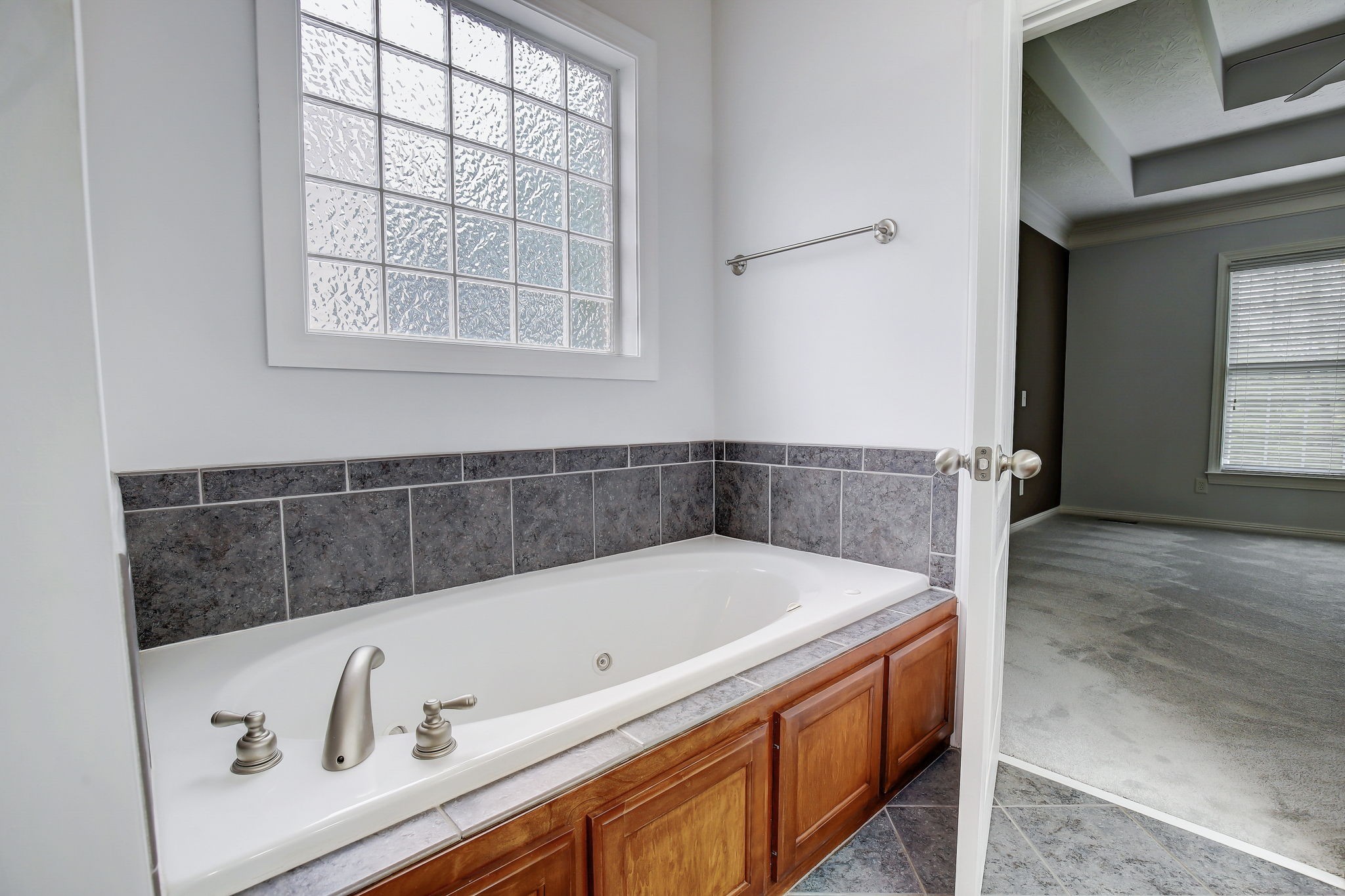 124 Cedar Ridge Lane Hendersonville, TN 37075 - Photo 33 of 66 a bathroom with a bathtub and a window
