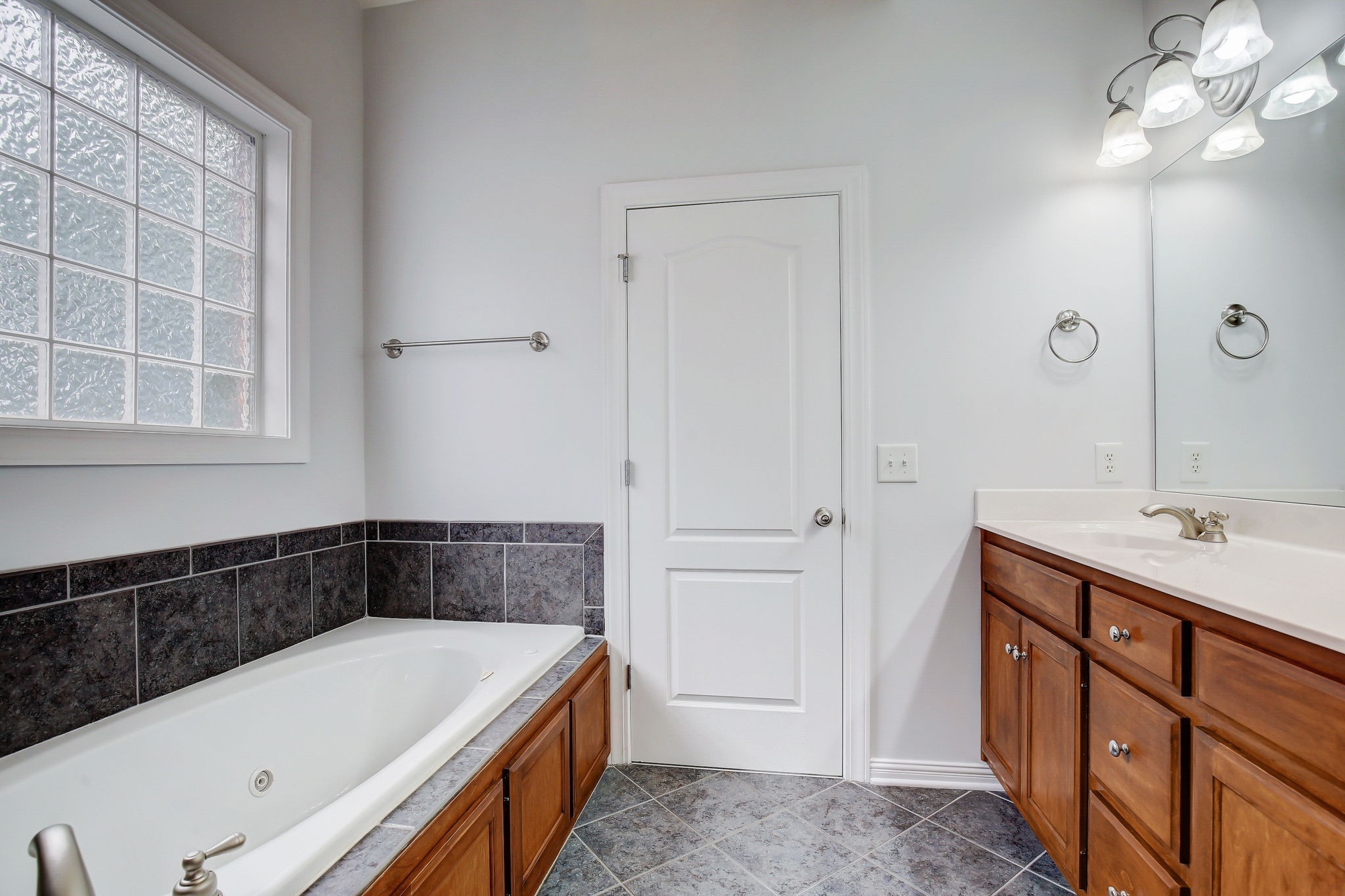 124 Cedar Ridge Lane Hendersonville, TN 37075 - Photo 34 of 66 a bathroom with a tub sink and mirror