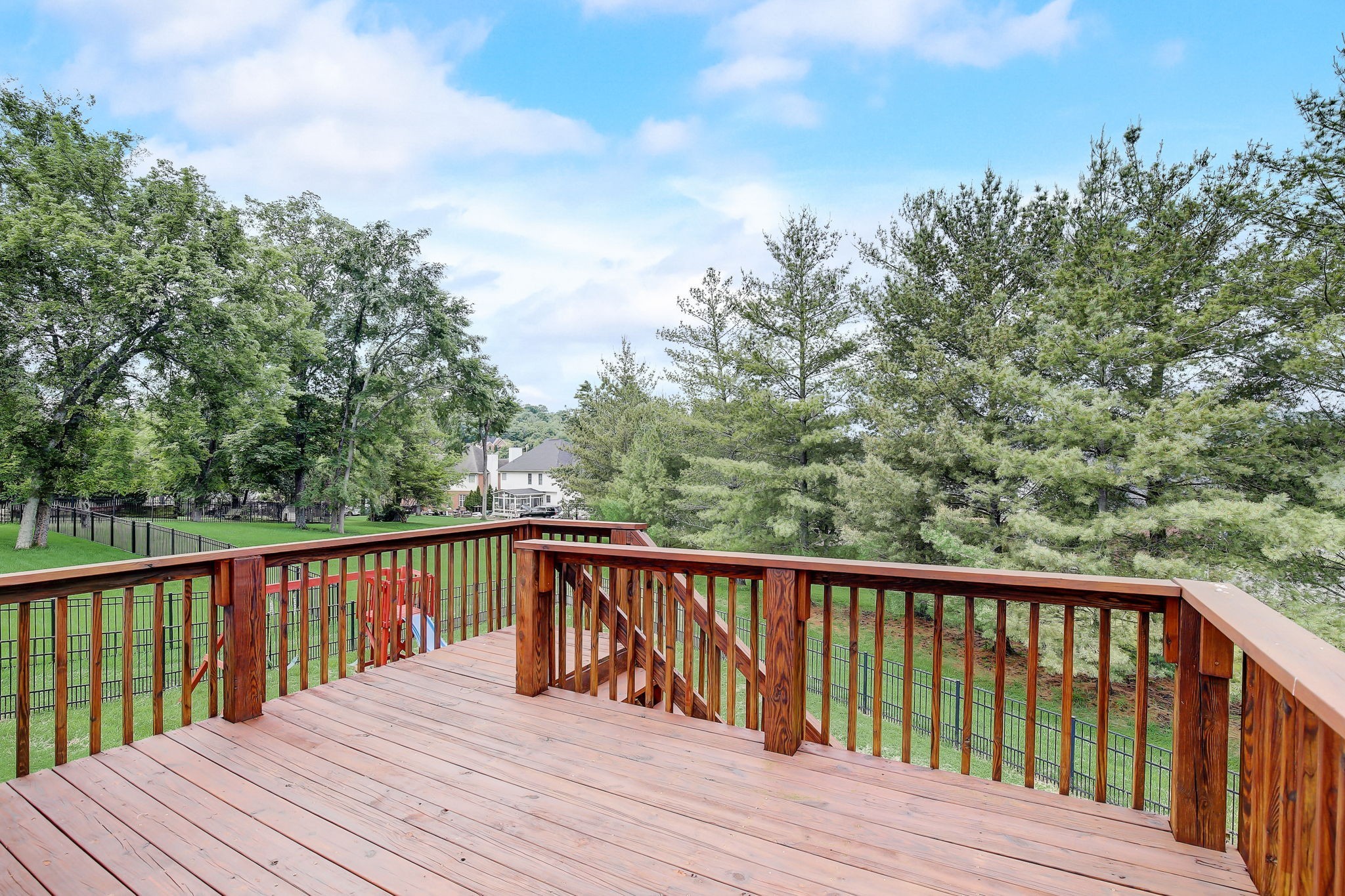 124 Cedar Ridge Lane Hendersonville, TN 37075 - Photo 51 of 66 a balcony with wooden floor and fence