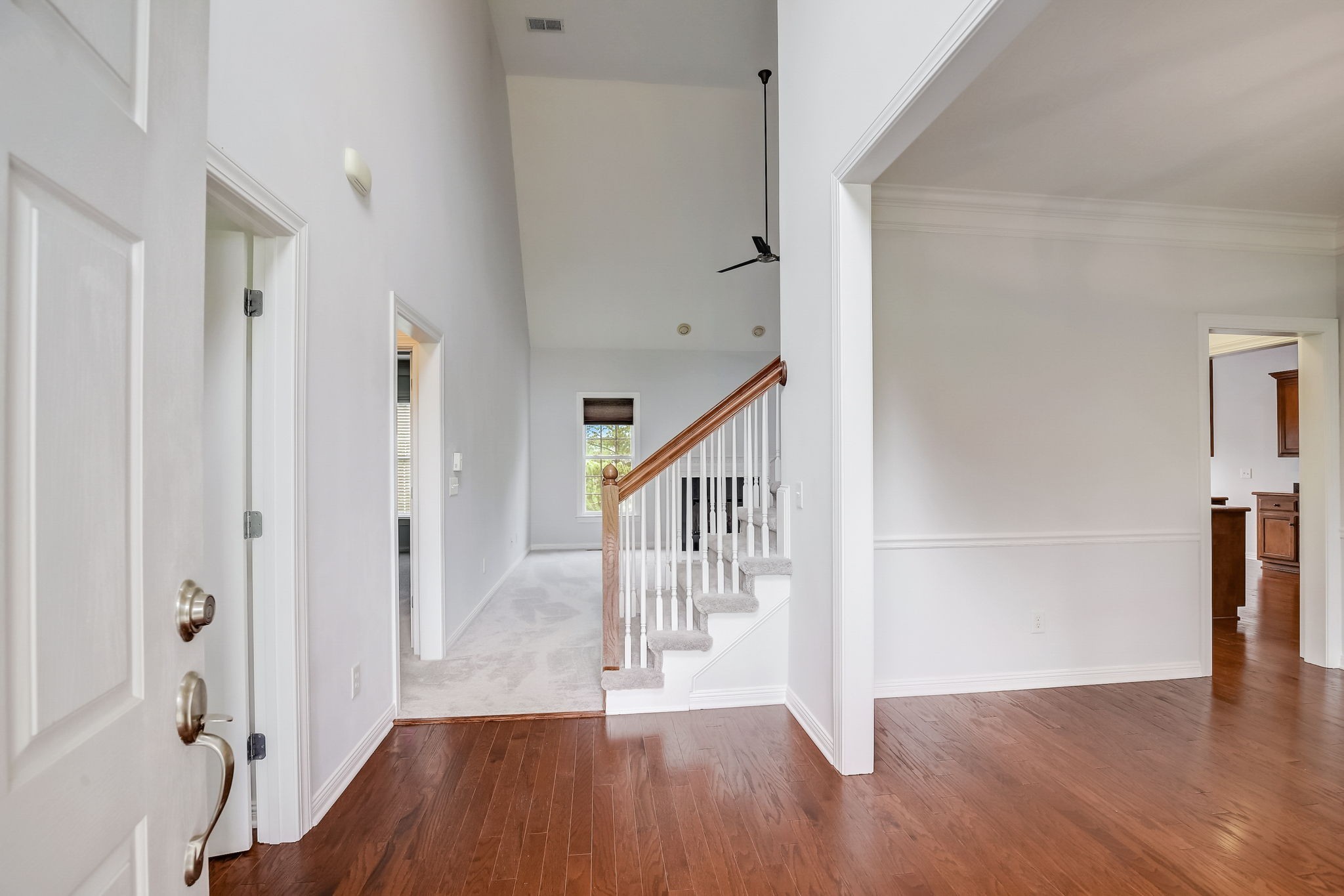 124 Cedar Ridge Lane Hendersonville, TN 37075 - Photo 7 of 66 a view of a hallway with wooden floor and entryway