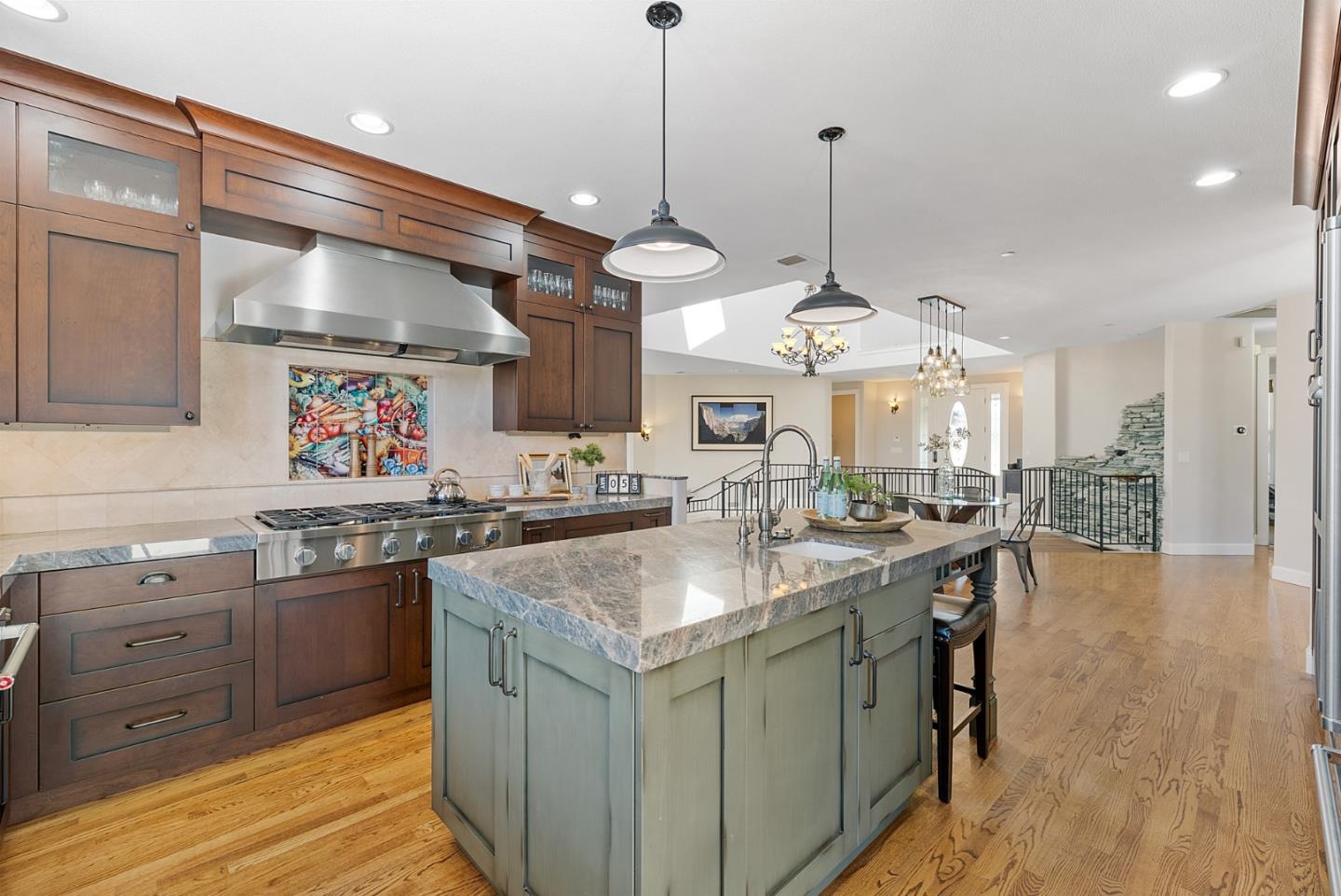 4460 Roop Road Gilroy, CA 95020 - Photo 14 of 68 a kitchen with stainless steel appliances granite countertop a sink a stove and a wooden floors