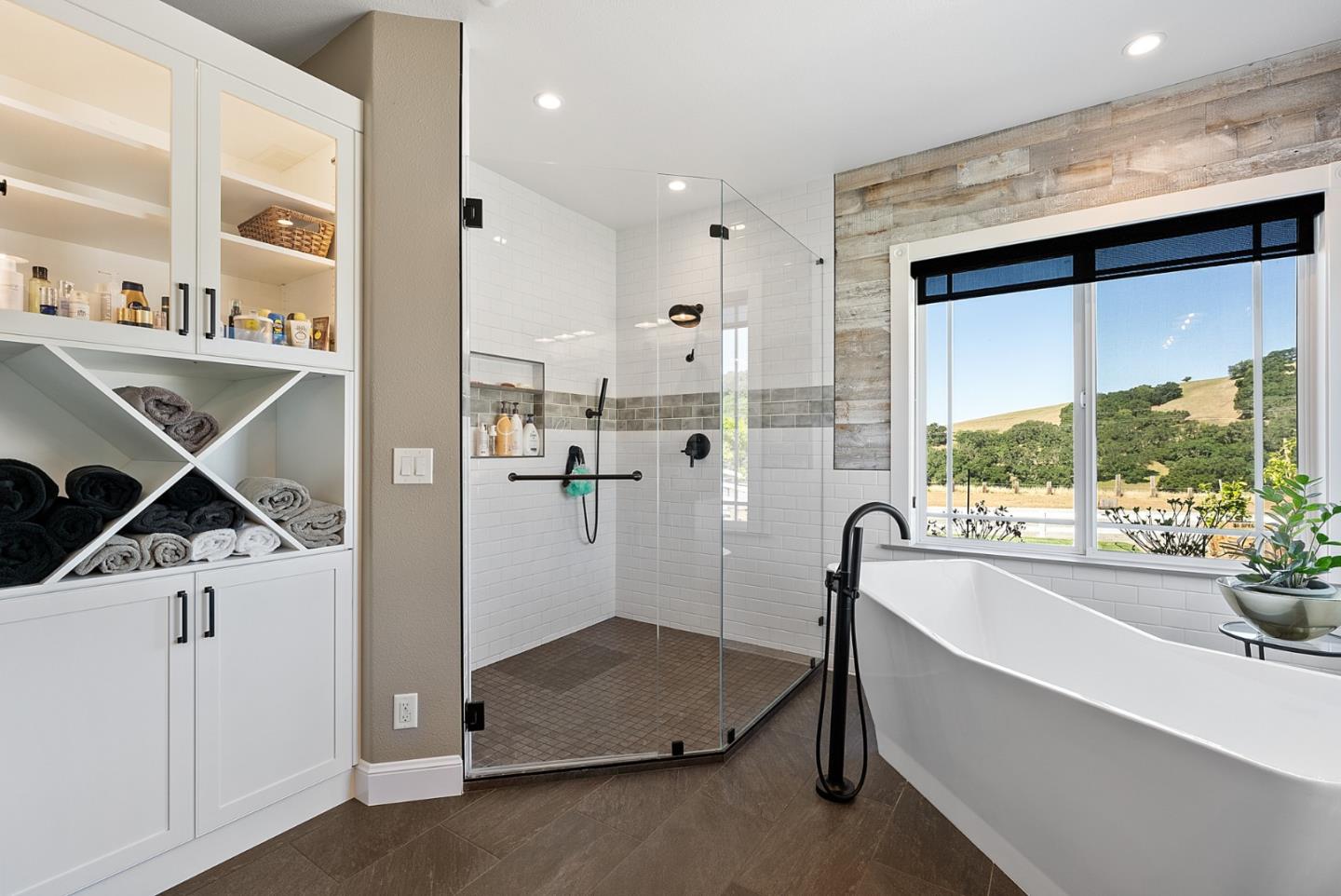 4460 Roop Road Gilroy, CA 95020 - Photo 26 of 68 a bathroom with a tub and sink
