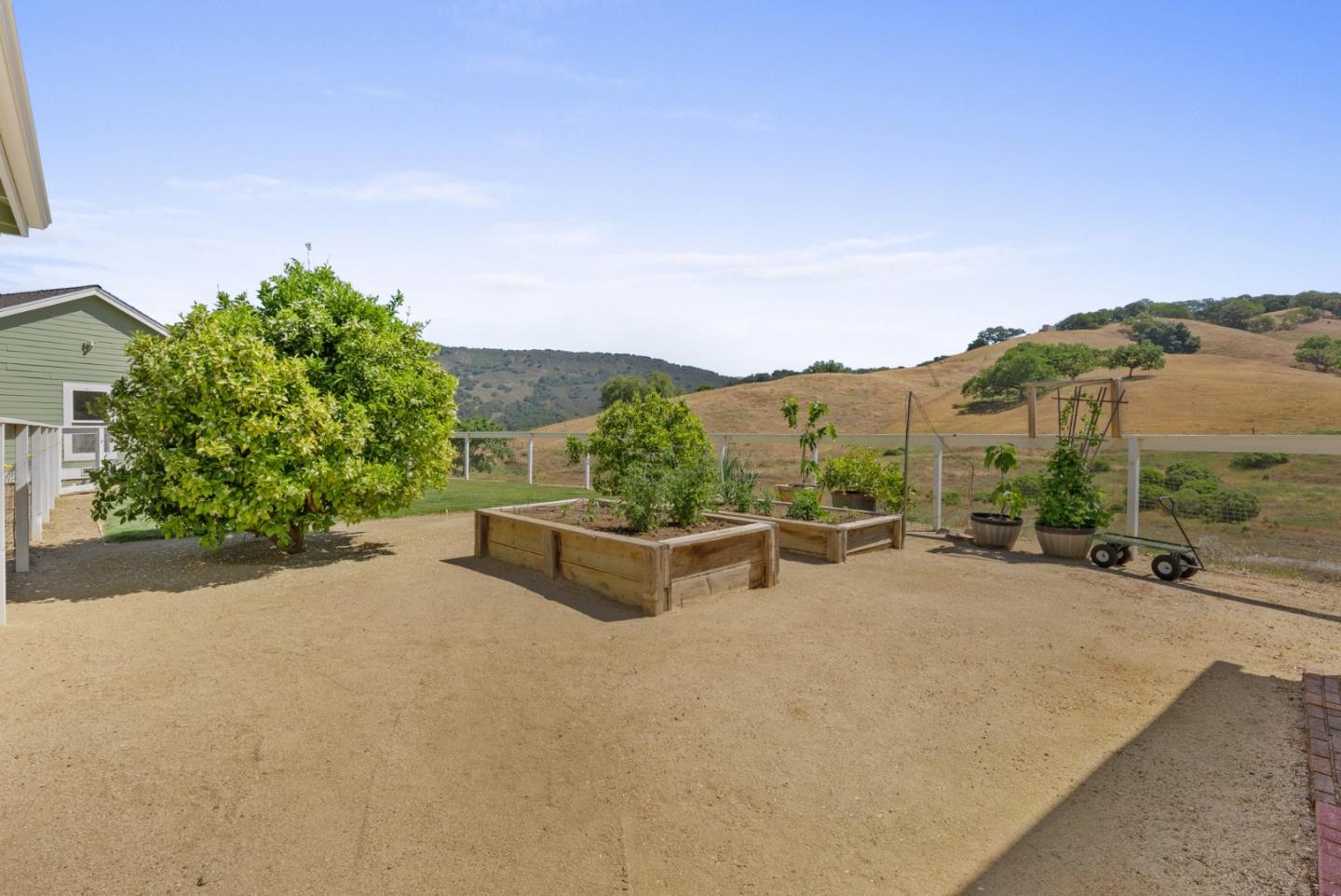 4460 Roop Road Gilroy, CA 95020 - Photo 41 of 68 a view of a terrace with yard and mountain view in back