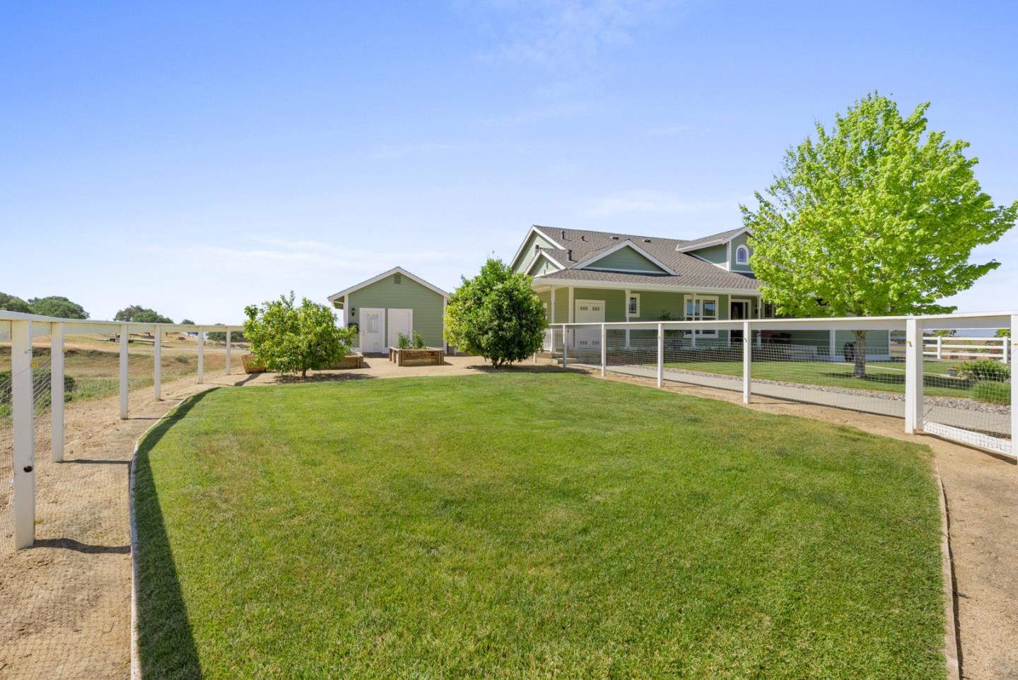 4460 Roop Road Gilroy, CA 95020 - Photo 53 of 68 a front view of a house with a yard
