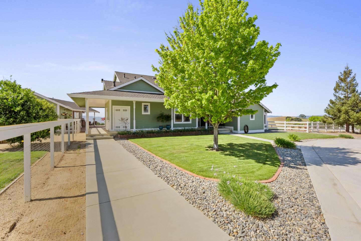 4460 Roop Road Gilroy, CA 95020 - Photo 55 of 68 a front view of a house with a yard