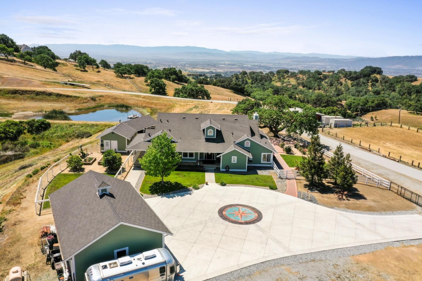 4460 Roop Road Gilroy, CA 95020 - Photo 56 of 68 an aerial view of a house with swimming pool and ocean view