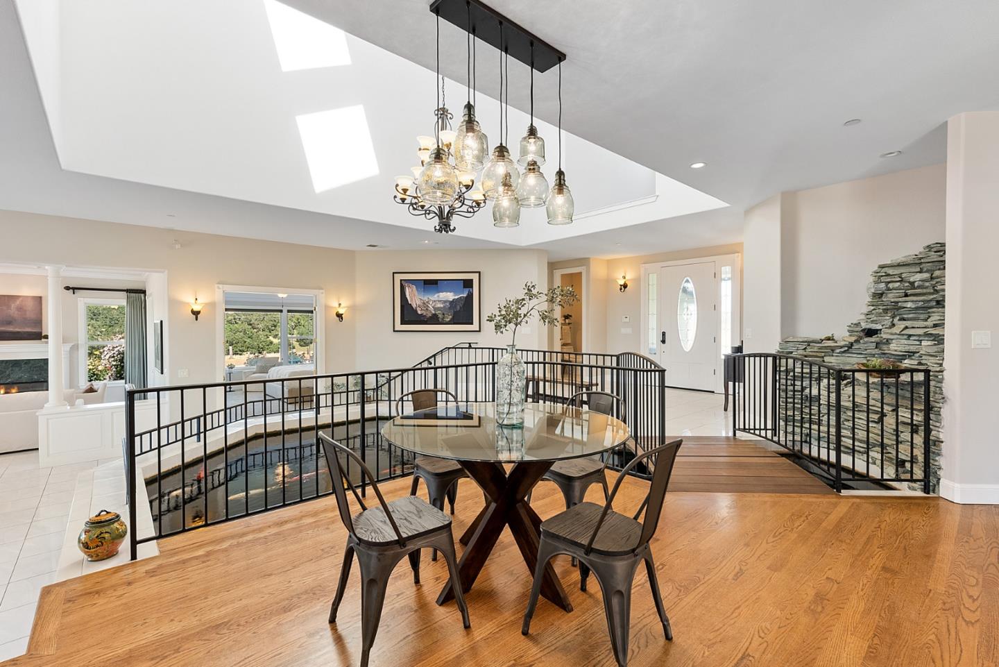 4460 Roop Road Gilroy, CA 95020 - Photo 10 of 68 a view of a dining room with furniture and chandelier